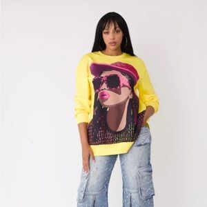 Yellow Graphic Sweatshirt with Pink and Black Design